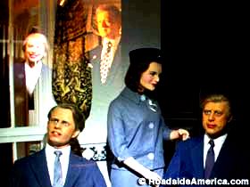 Bill and Hillary look in on RFK, Jackie, and JFK.